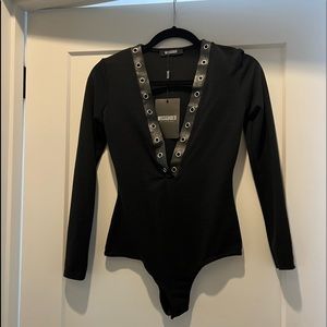 MISSGUIDED body suit with metal circle emblements